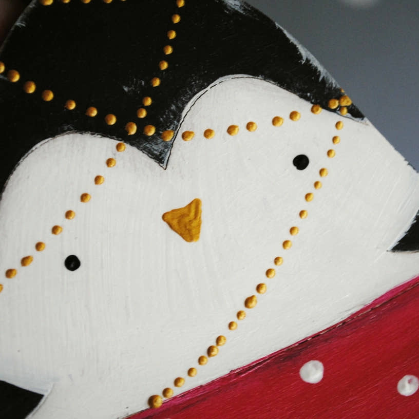 Close up of Handmade Penguin in Teacup Wooden Ornament by HandyHappy