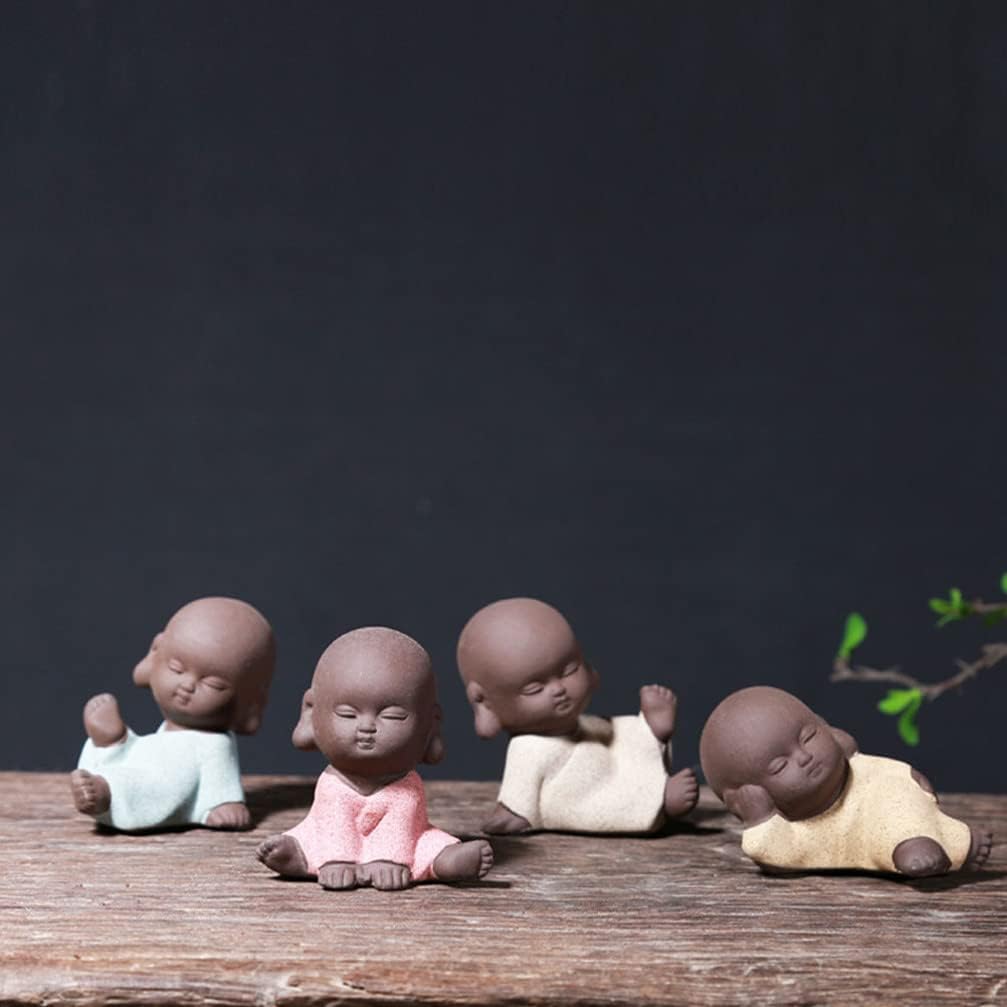 Collection of four brown purple clay Baby Buddha Tea Pets in blue, pink, white, or yellow