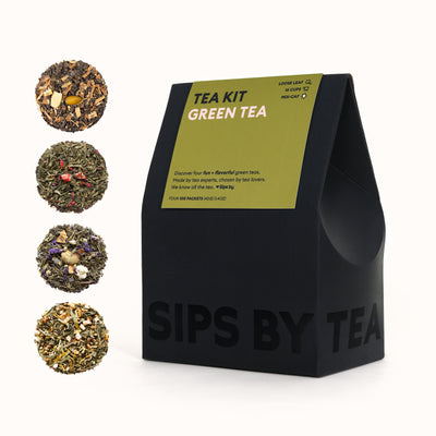 Black box with a green topper and pink print that says "Green Tea Kit - Made by tea experts, chosen by tea lovers. We know all the tea. Love Sips by. Makes 16 Cups. Four 10G Packets (40G) (1.4OZ)"