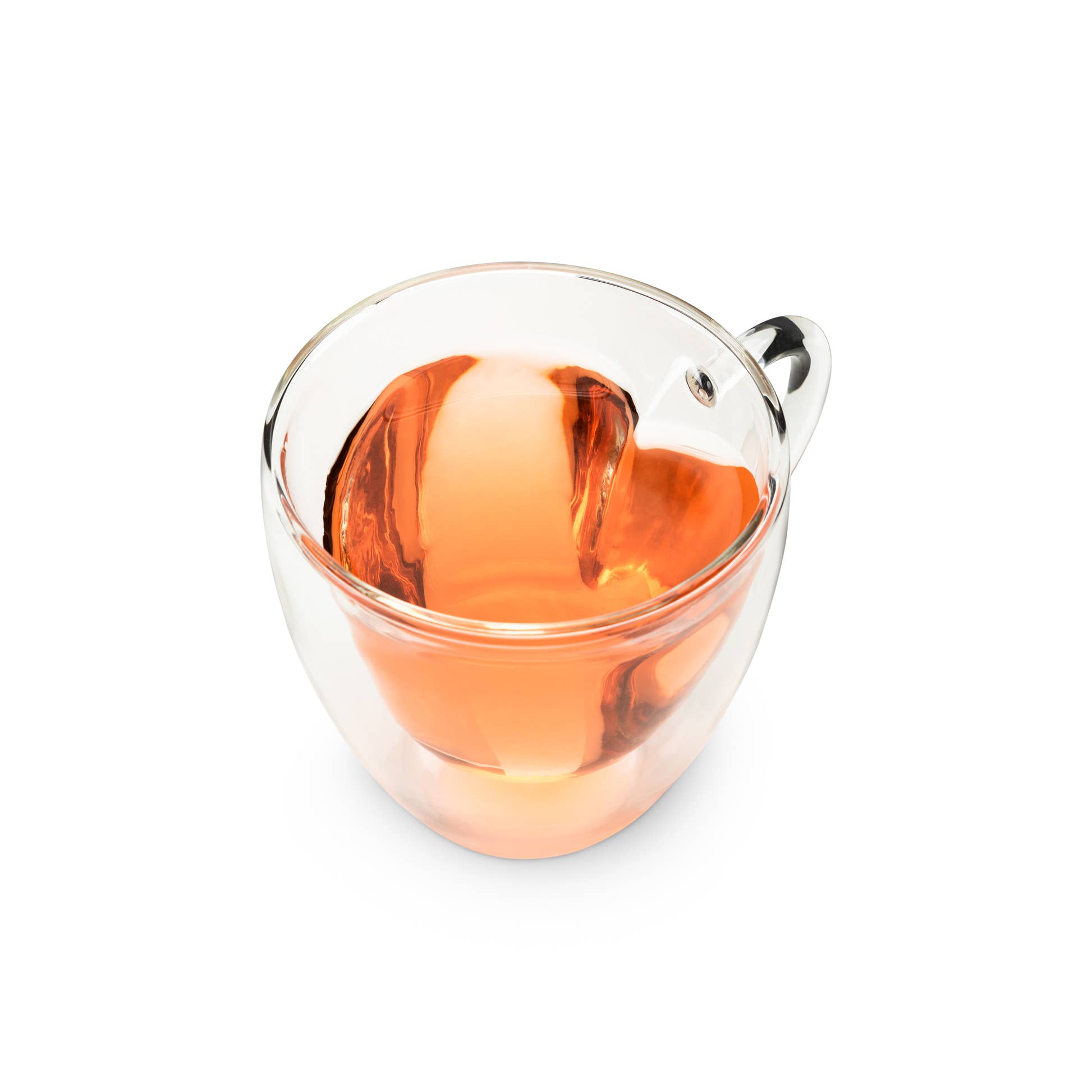 Double-walled glass heart mug with tea