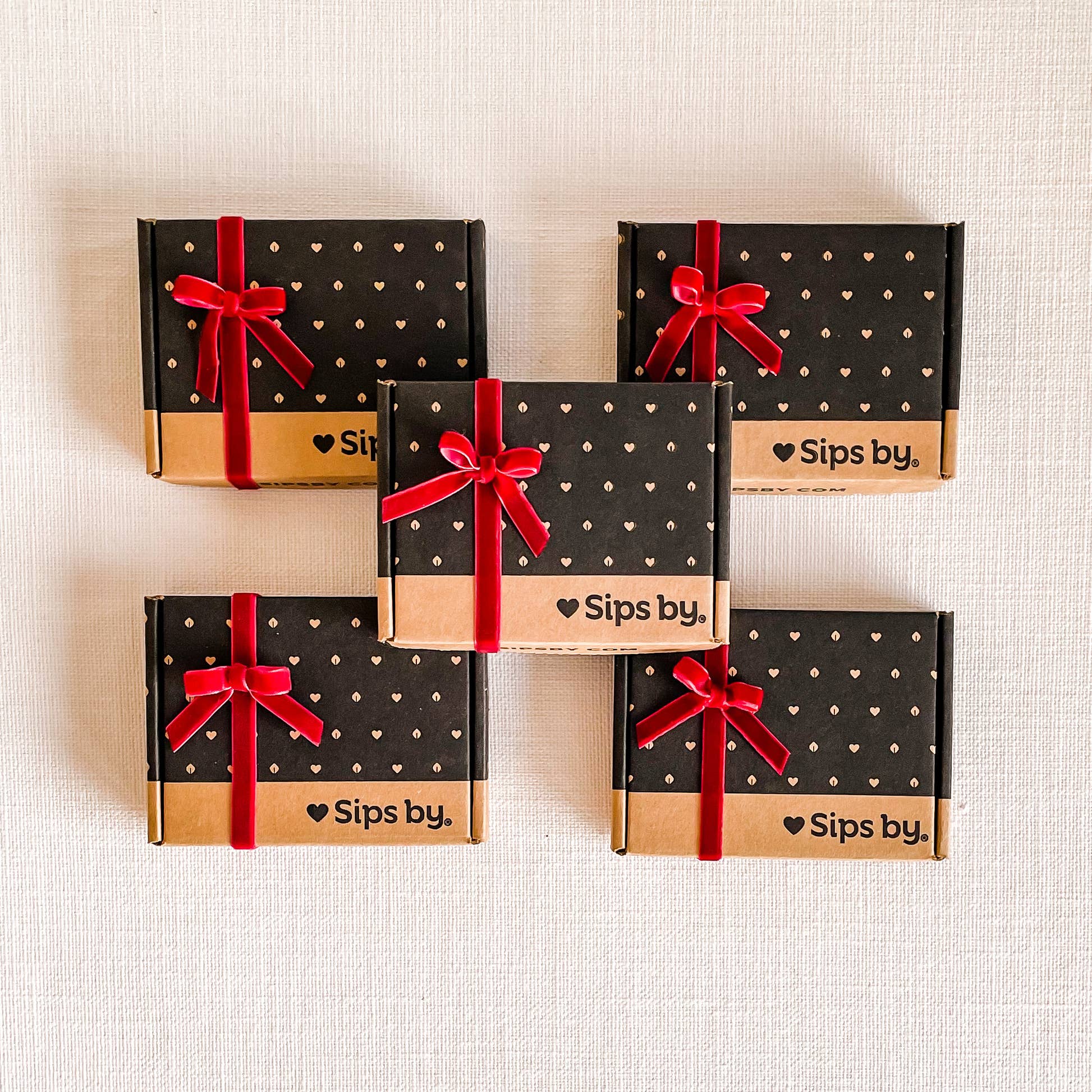 5 mini Sips by boxes with red velvet bows