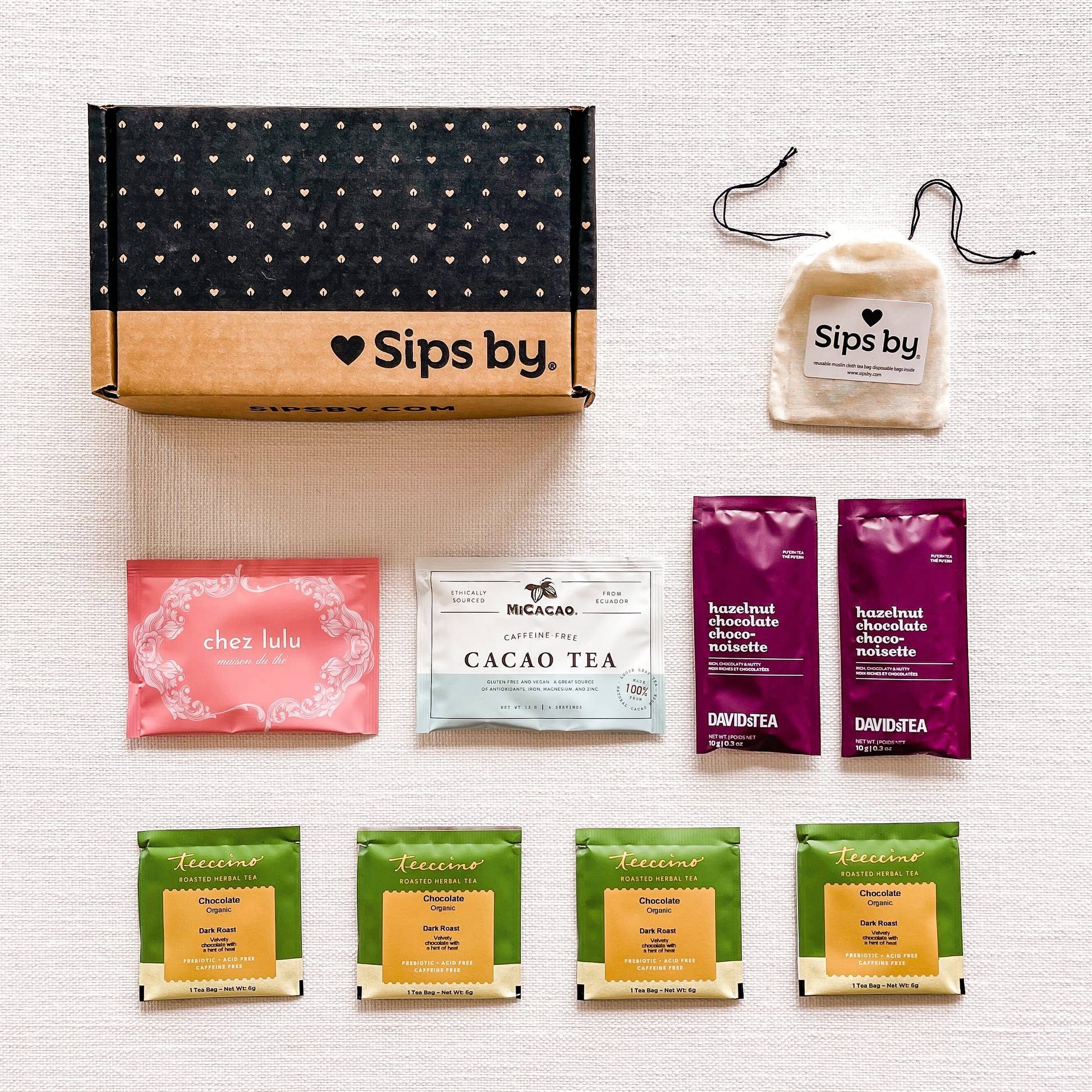 Four samples of chocolate tea with a Sips by Box and disposable tea filters