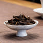 TeaVivre Fengqing Dragon Pearl Black Tea pouring steeped tea leaves