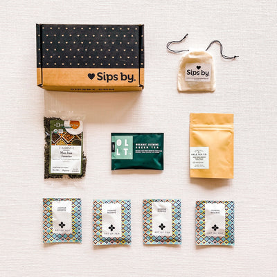 Jasmine tea samples with the Jasmine Tea Box from Sips by and bag of disposable tea filters